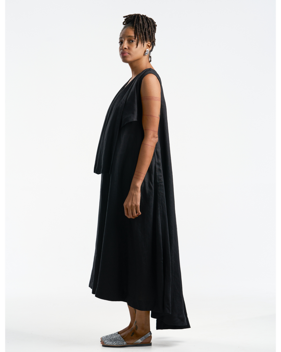 THE CLOTH Anthurium Dress with a deep V-neckline and convenient pockets