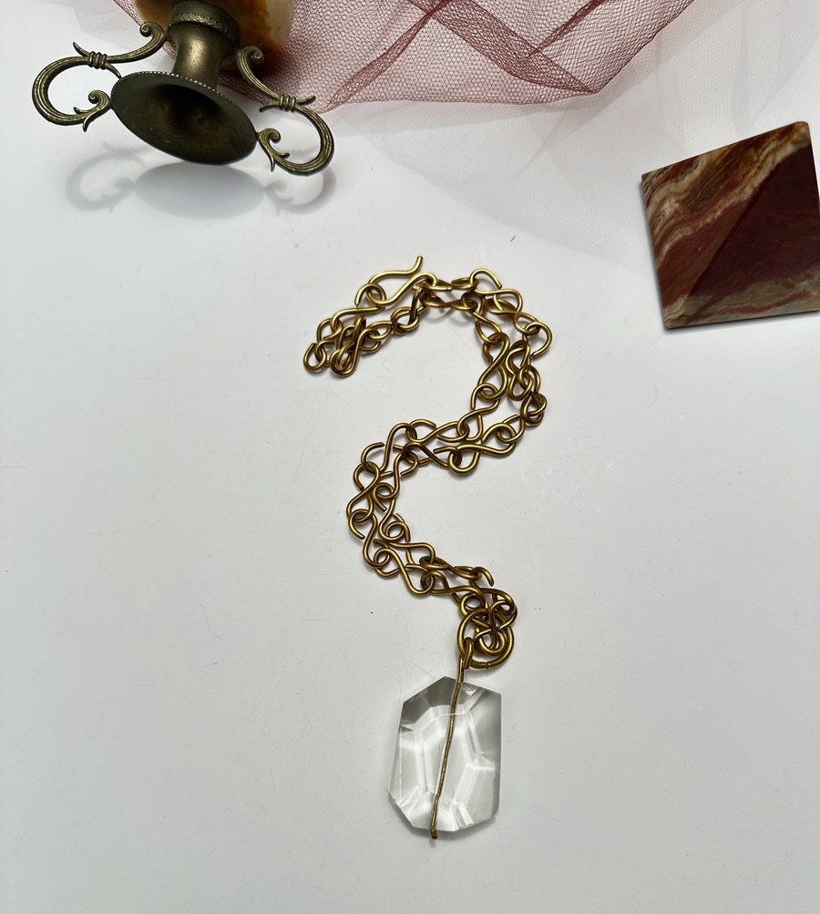 Renikeji Keji Necklace with a clear glass pendant