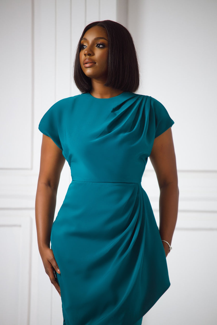 Erilyn Grace dress with a draped shoulder and waistline detail