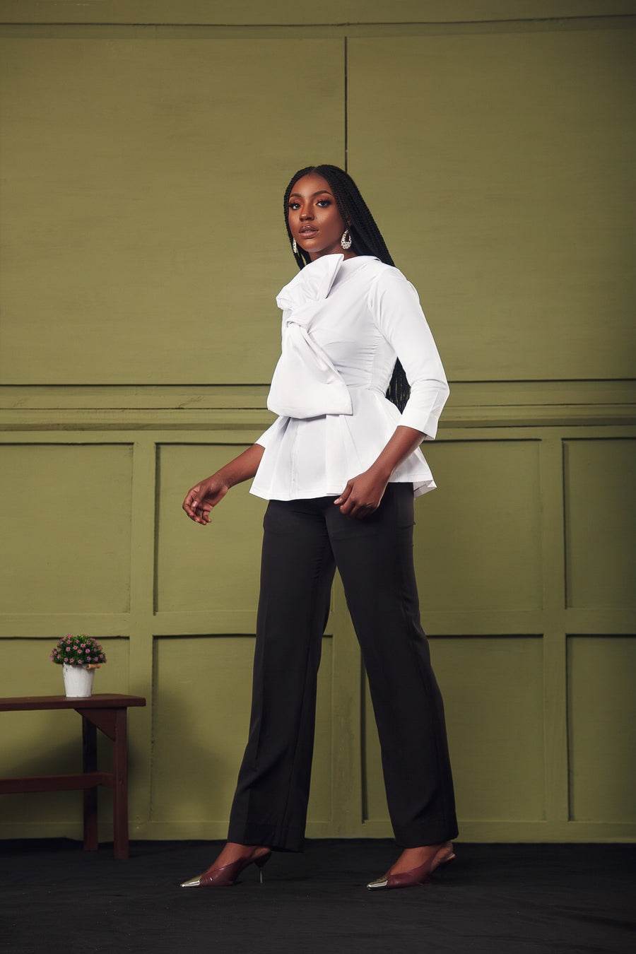 Erilyn EVE shirt with a knotted detail at the neck