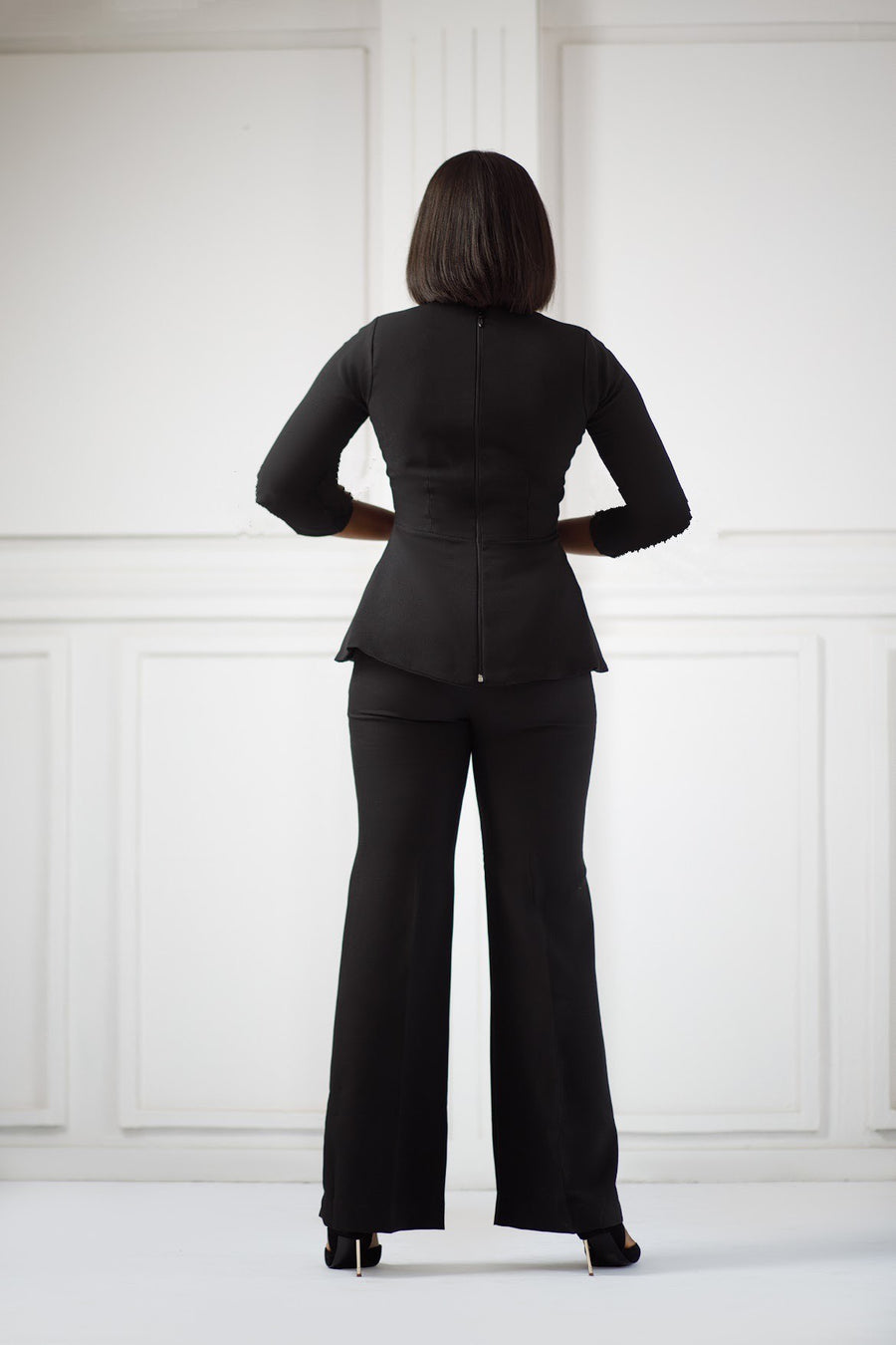 Erilyn Funmilayo set with a peplum top and flared-leg trousers