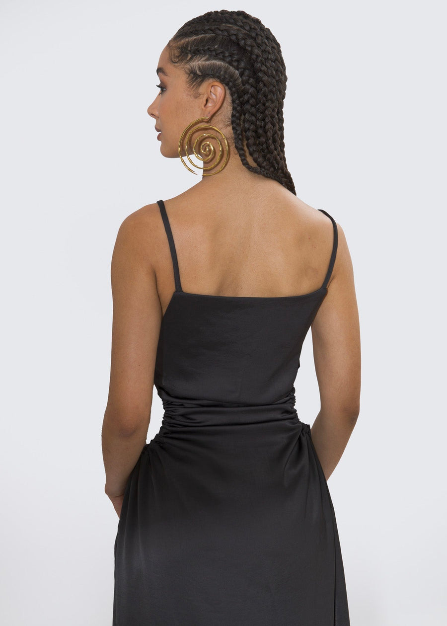 Olooh Laurene maxi dress with Bronze buttons adorning the side opening