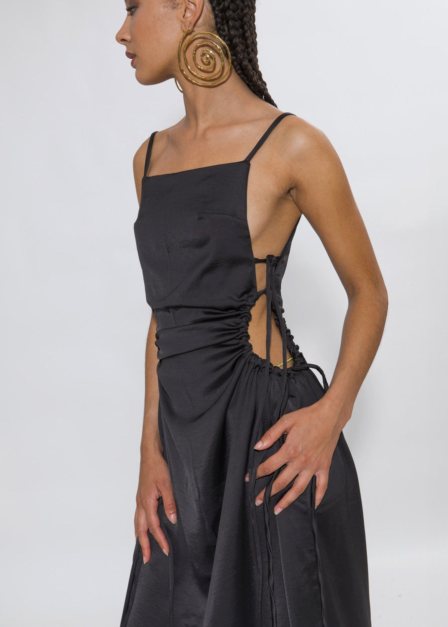 Olooh Laurene maxi dress with Bronze buttons adorning the side opening