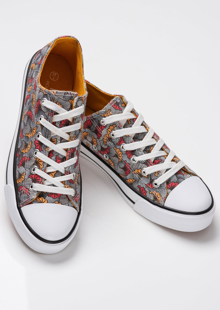 Mikono Mwangaza Sneakers with white laces and a light rubber sole